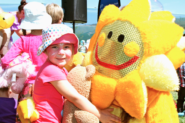 A young local gets up close with Mrs Sun.